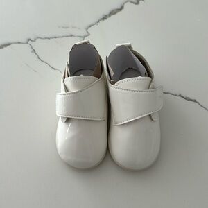 White patent baby shoes